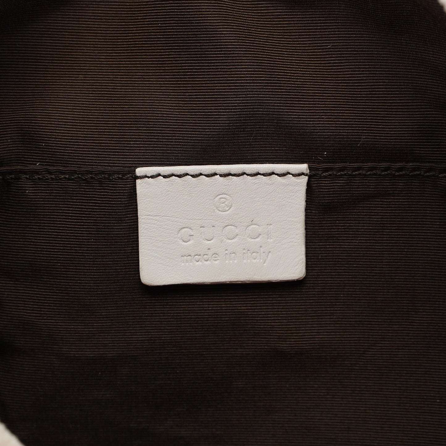 Beige Perforated Leather Drawstring Bag