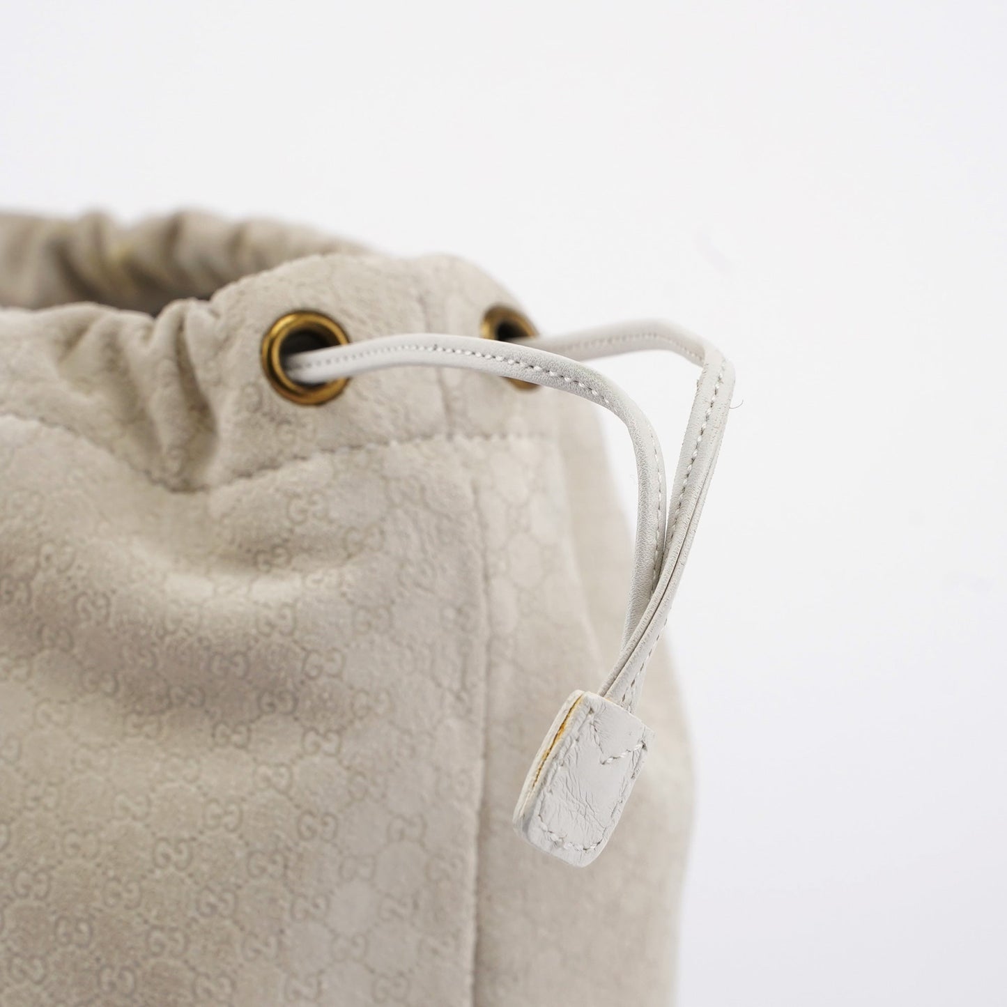 Beige Perforated Leather Drawstring Bag