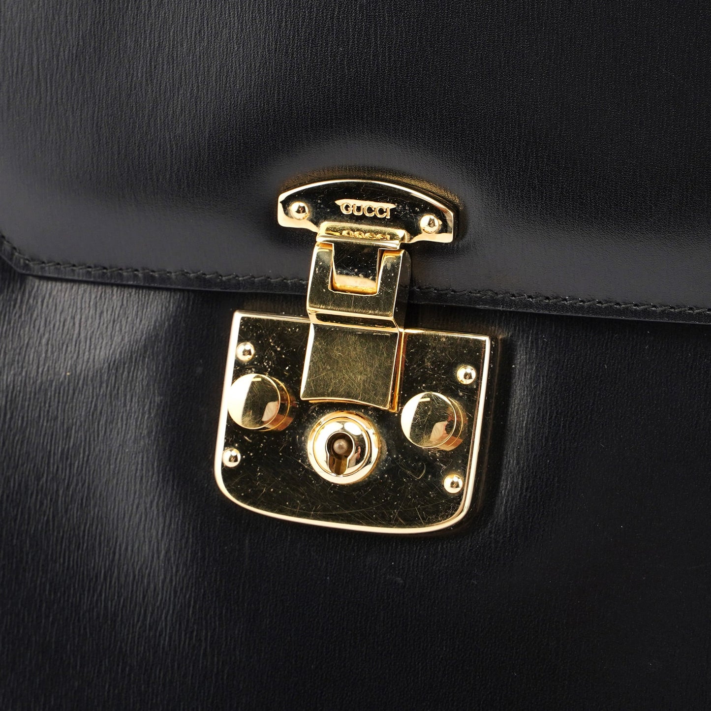 Black Calfskin Lady Lock Top Handle Bag