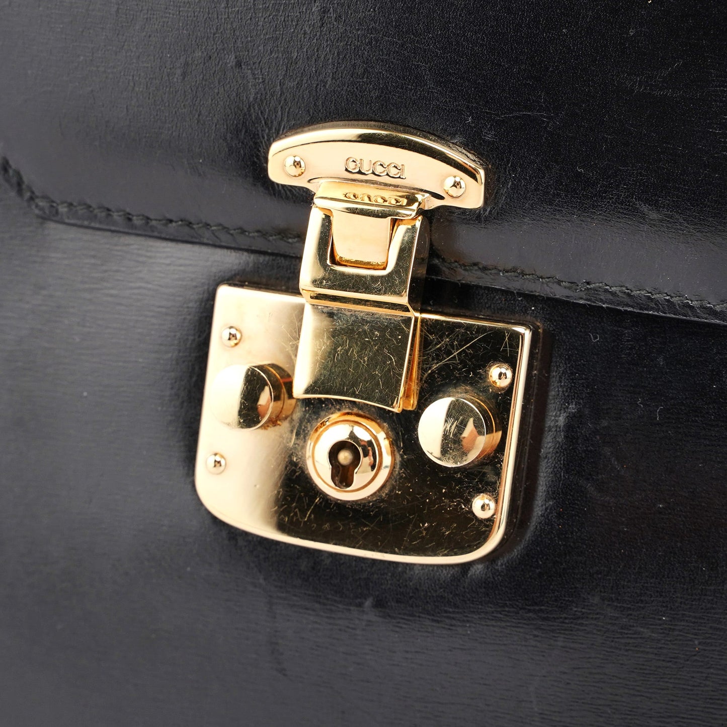 Black Calfskin Ladylock Top Handle Bag